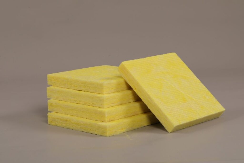 Fiberglass insulation boards stacked for home energy efficiency upgrades